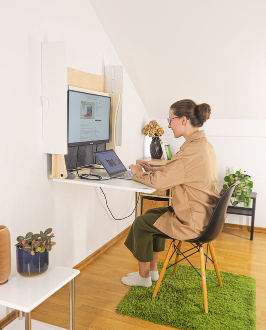 Wall height adjustable desk